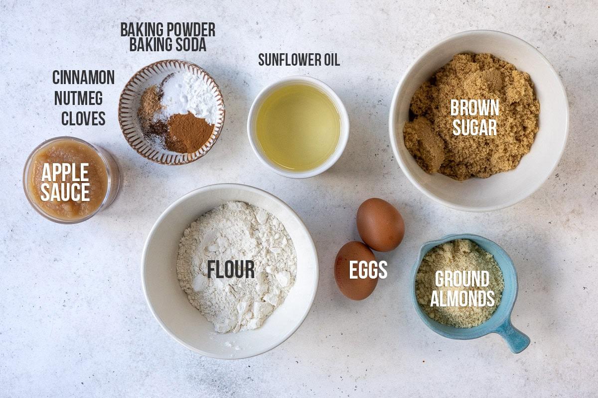 Apple cake ingredients on a white background with labels