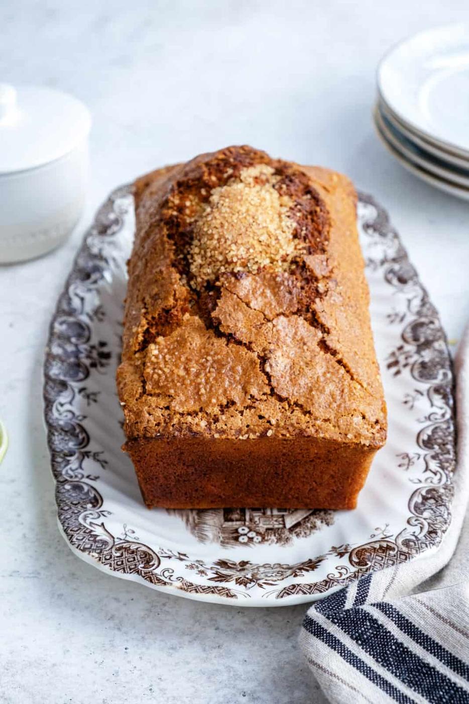 Air fryer banana loaf cake on a patterned plate