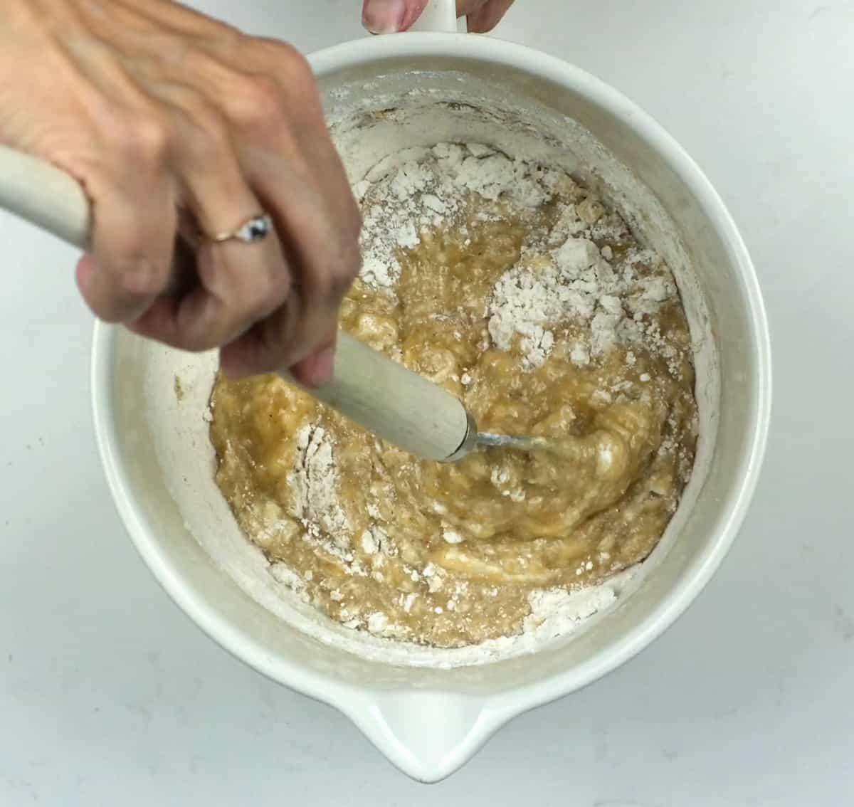 Mixing air fryer banana bread batter in a bowl
