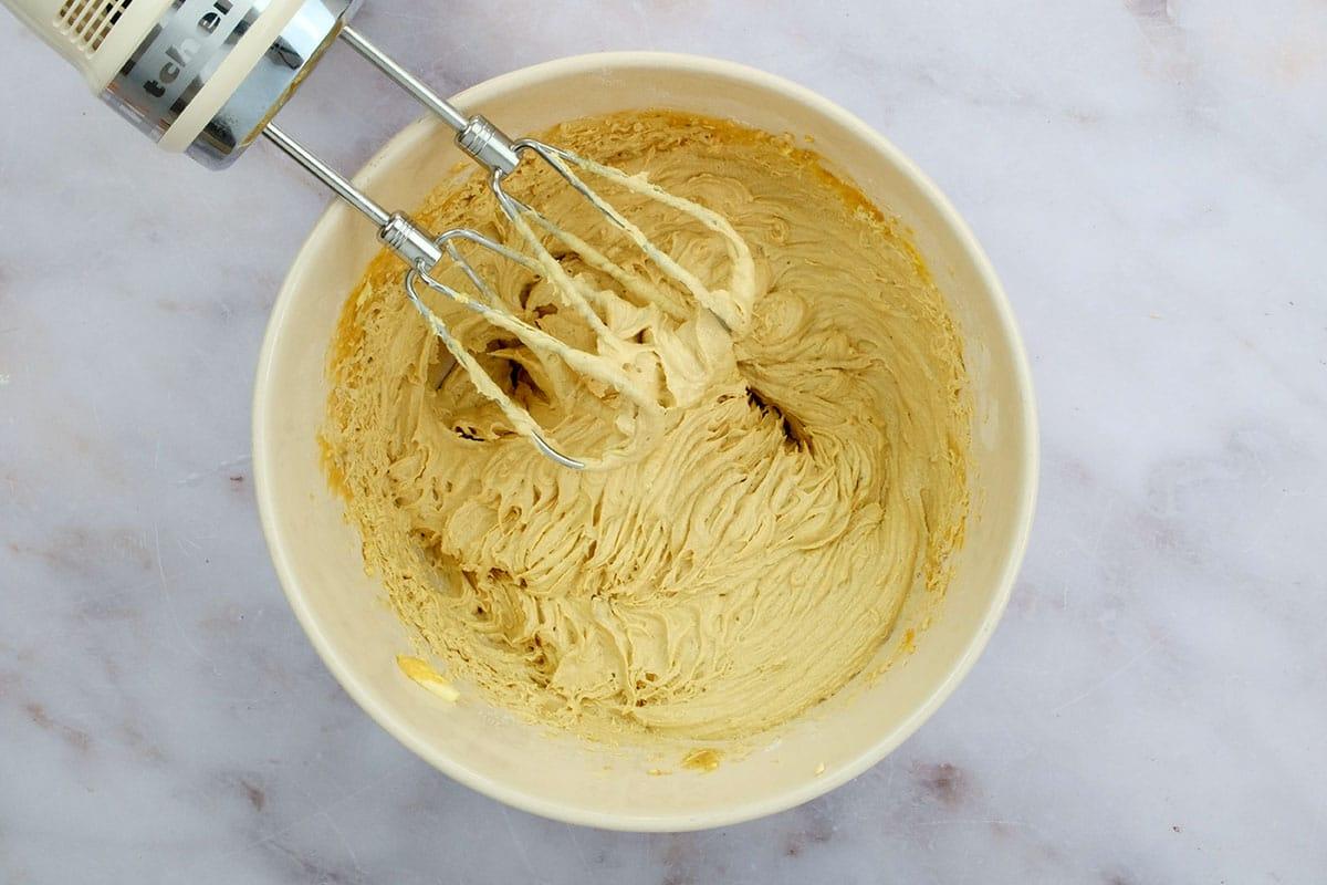 beating cake batter with a hand mixer