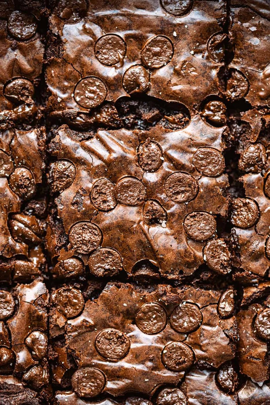 sliced air fryer brownies topped with chocolate chips, overhead view