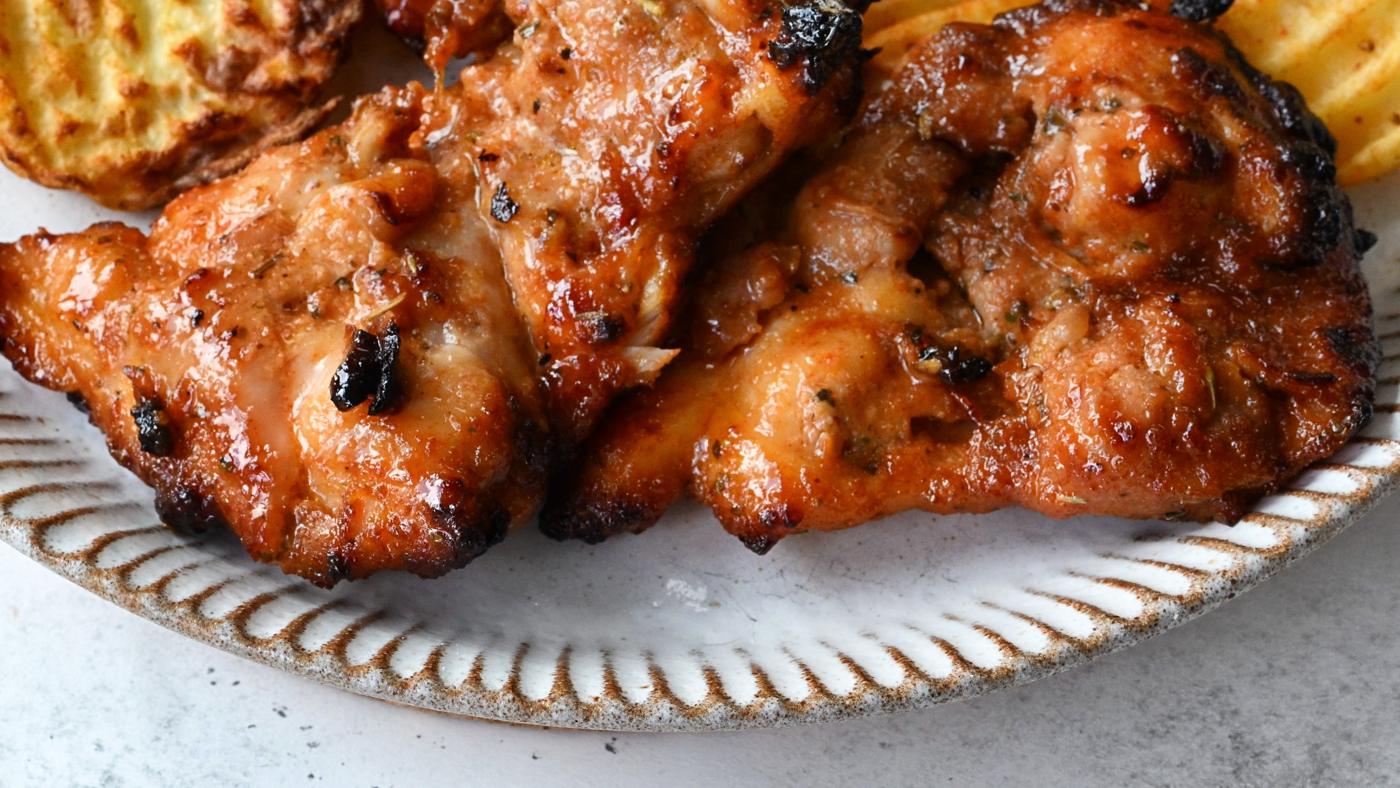 Close up on air fryer chicken thighs