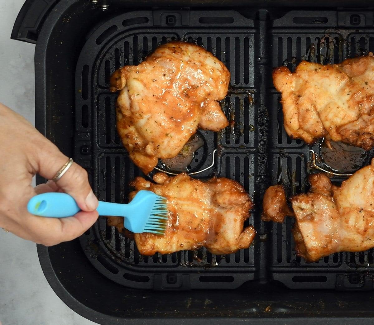 basting chicken thighs with marinade