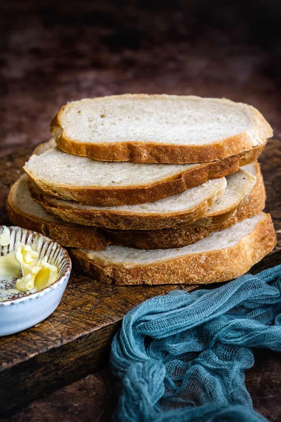 slices of air fryer bread on a wooden board