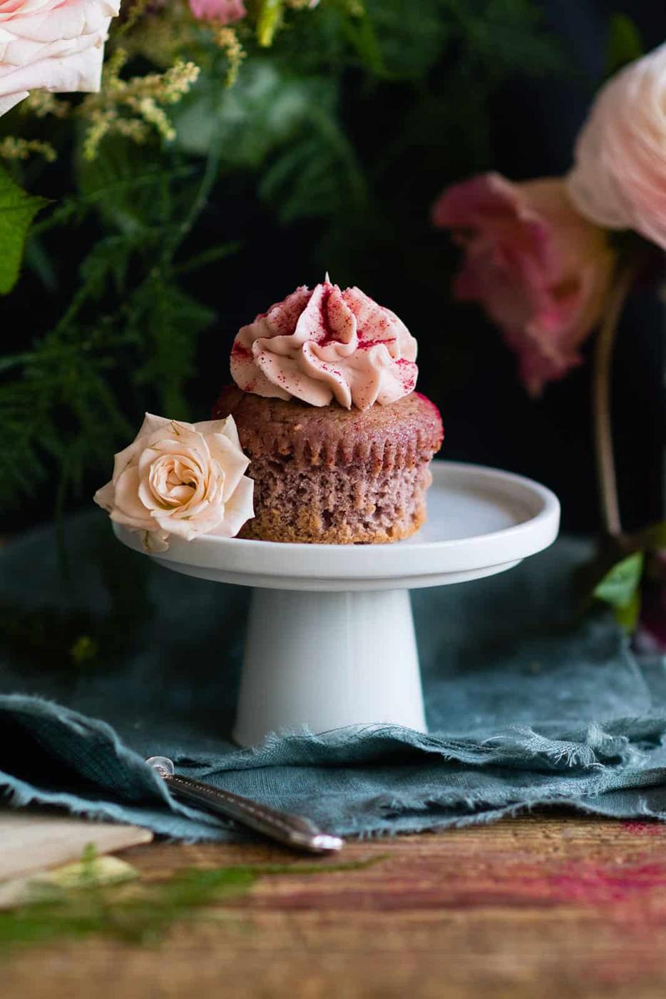 frosted cupcake on s mall cake stand