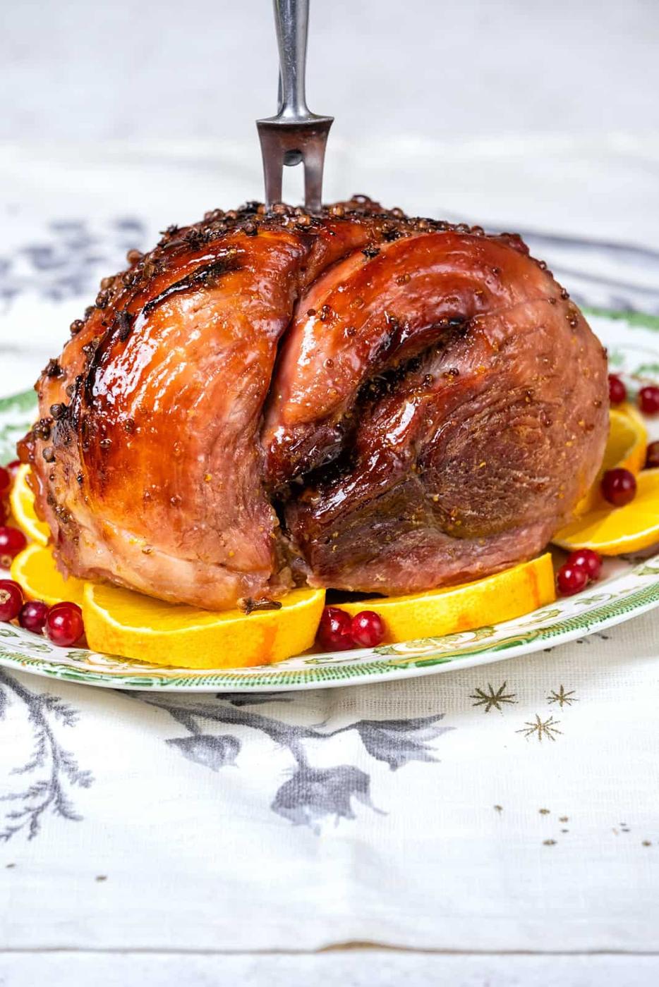 Glazed ham joint on a platter