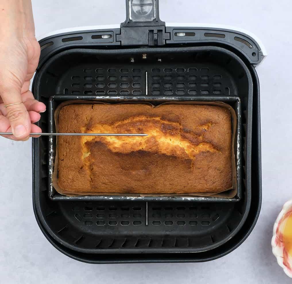 testing lemon drizzle in an air fryer basket
