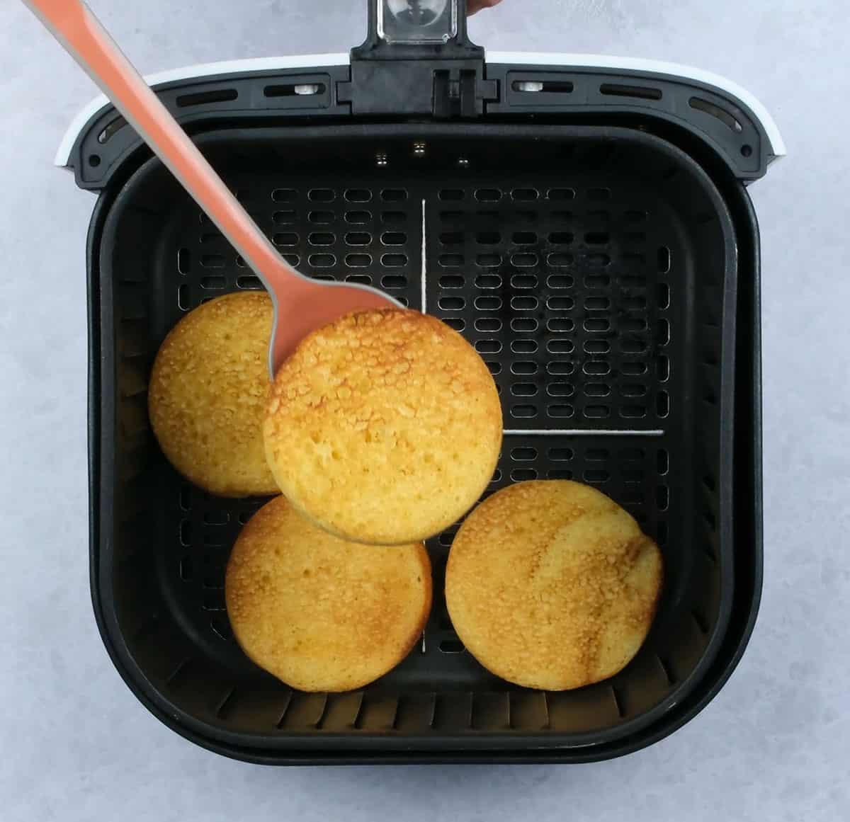 four Air fried pancakes, one lifted with spoon