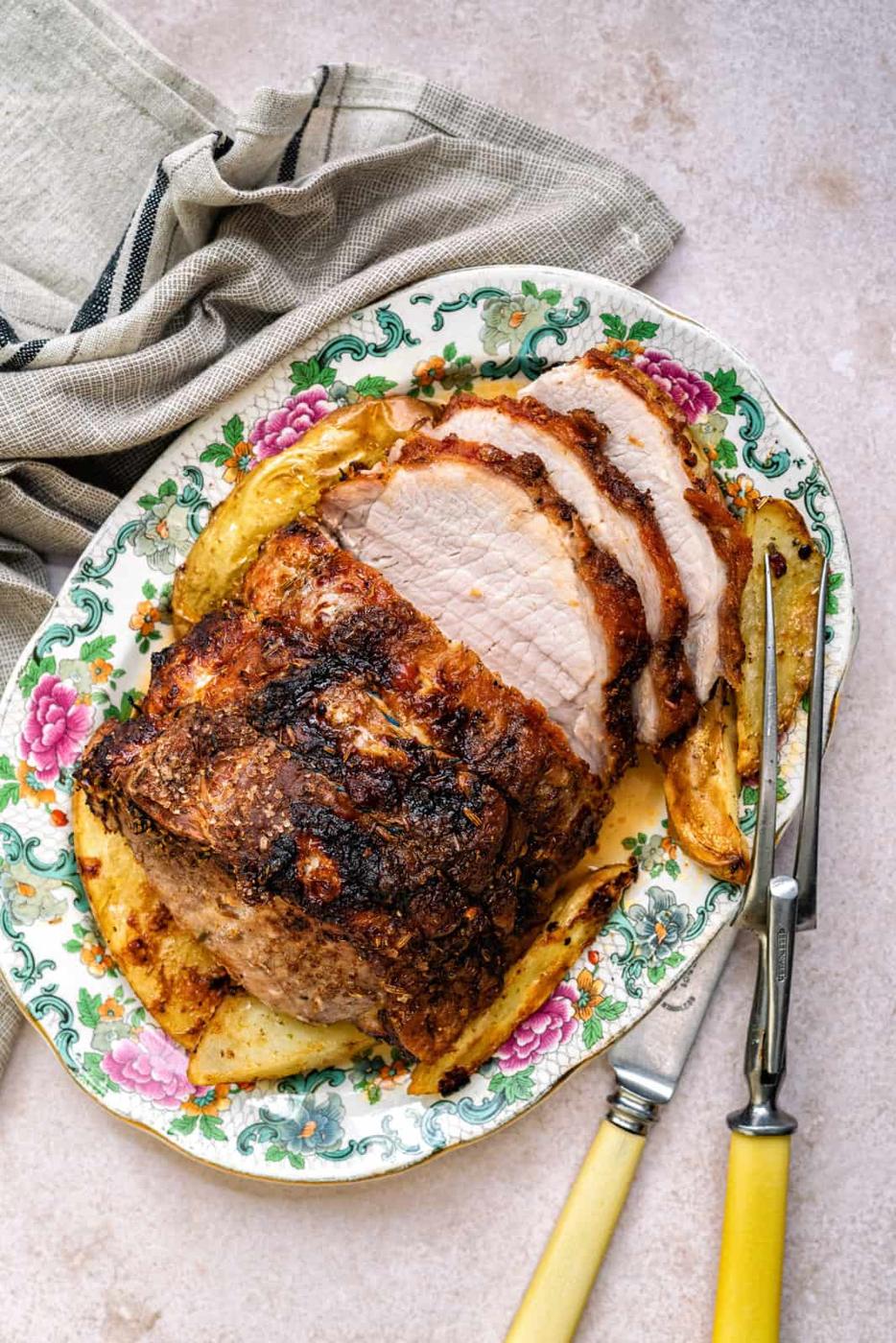 Air Fried pork loin sliced on a platter