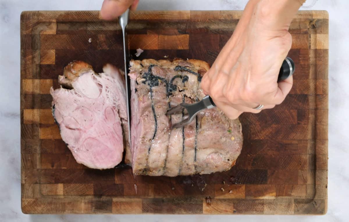 overheat shot of slicing pork roast