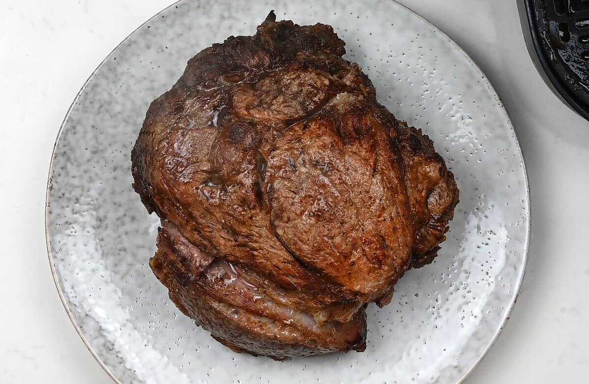 roasted boneless prime rib on a plate