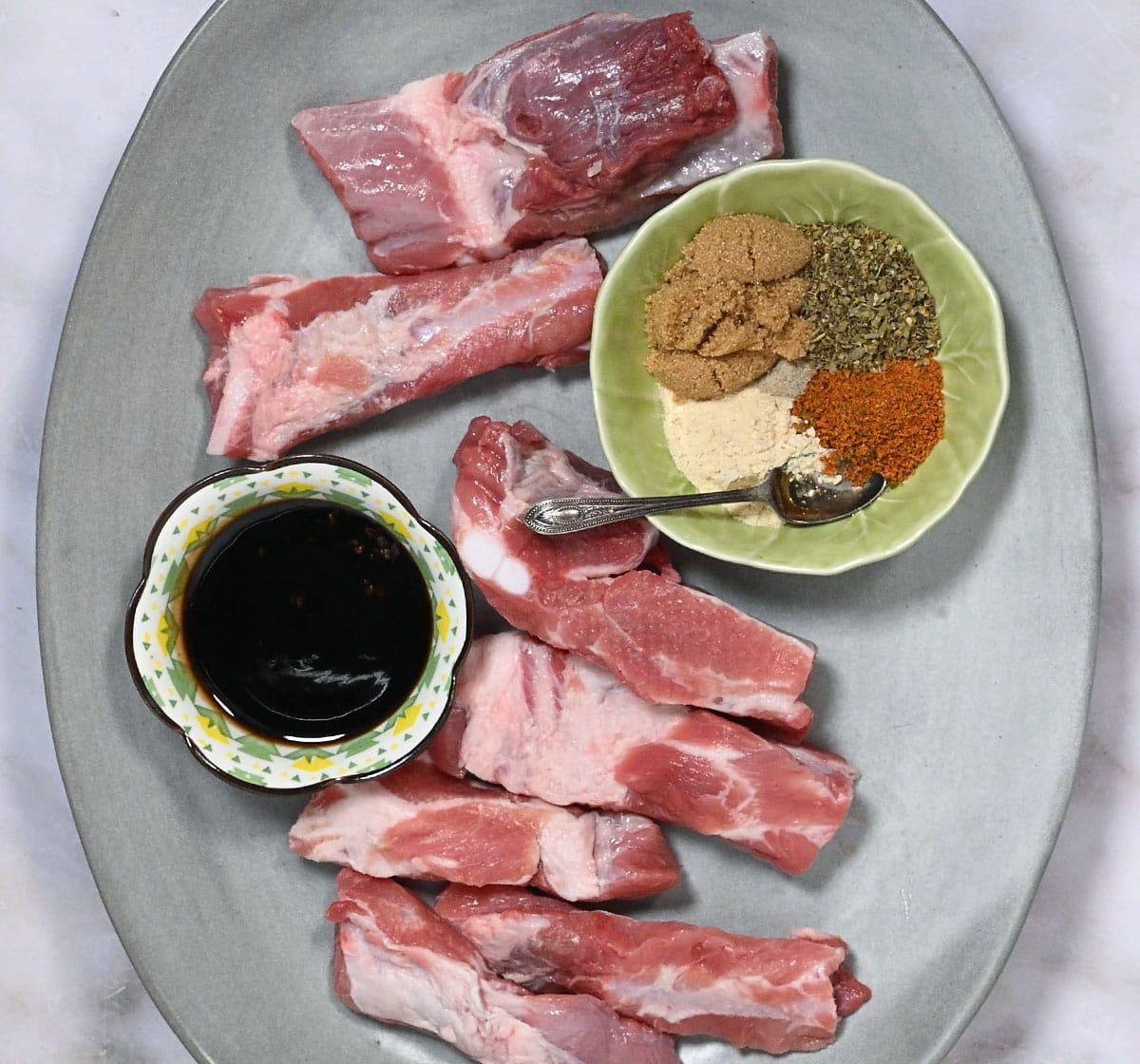 Ingredients for air fryer ribs on a platter