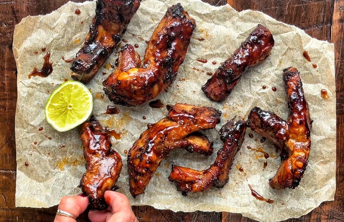 serving of pork ribs with sticky barbecue sauce