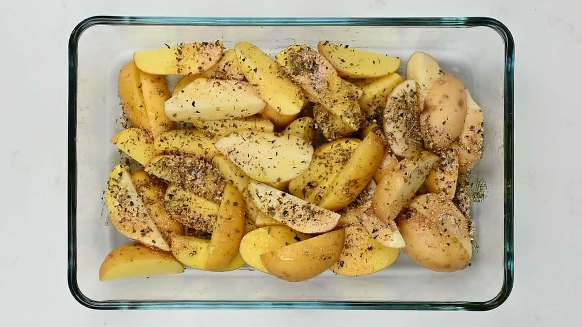 potato wedges in a pyrex dish