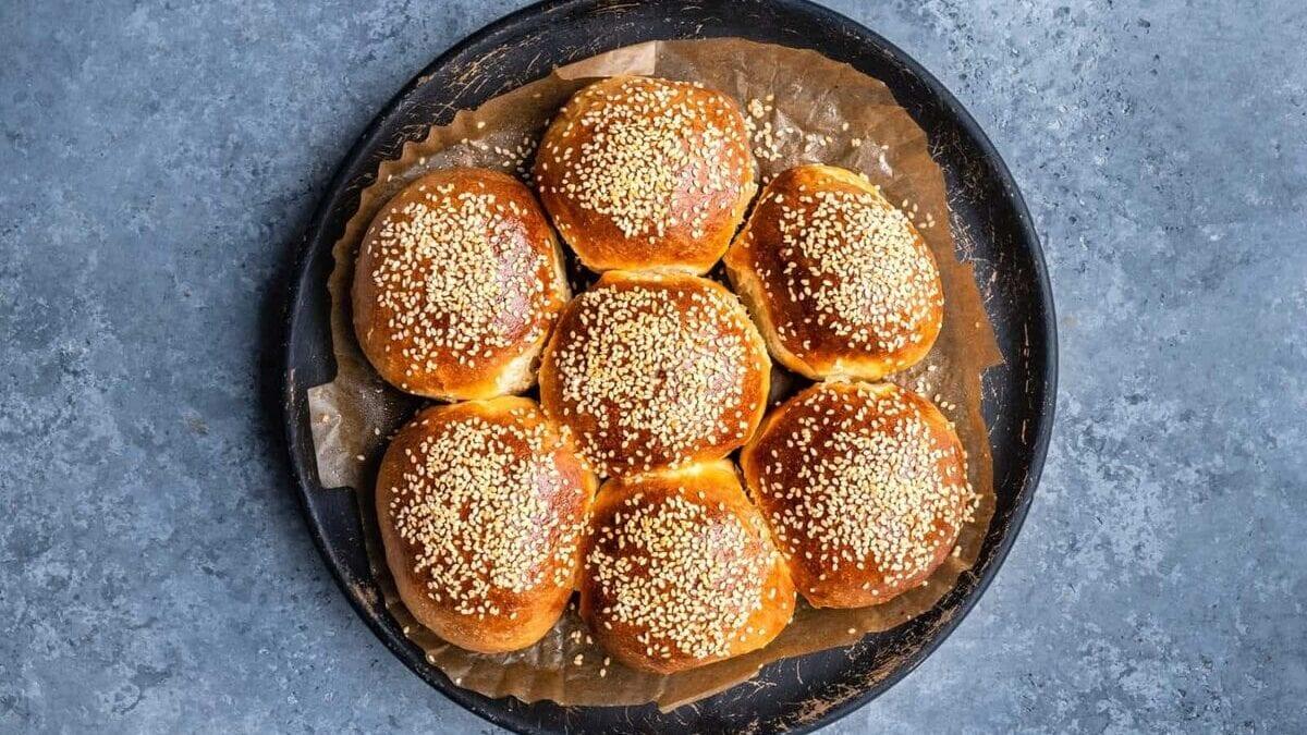 Milk buns on a wooden plate