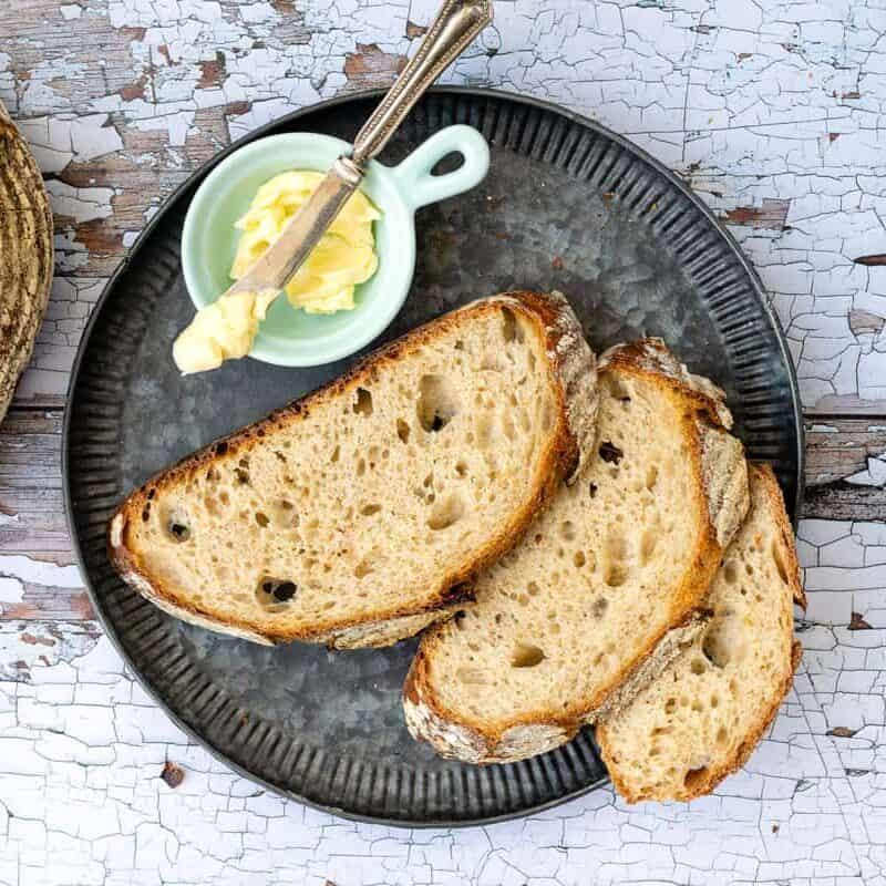 slices of sourdough bread with butter on the side