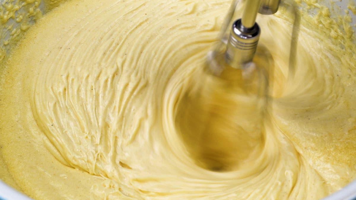 making cake or cupcake batter in a mixing bowl