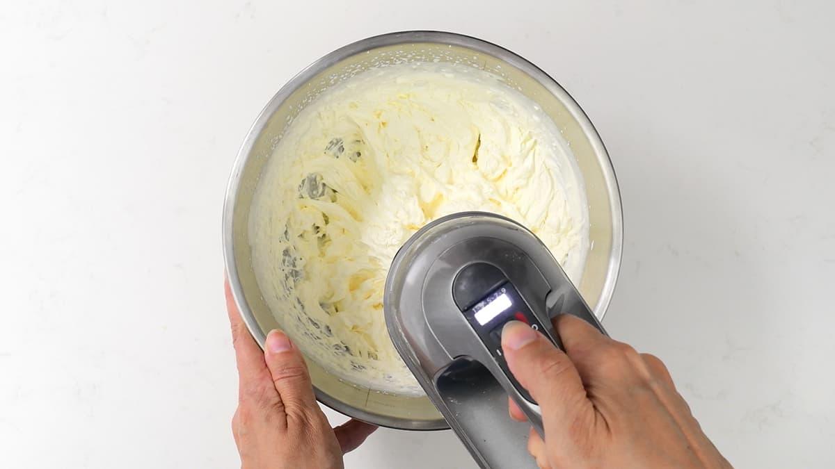 Whisking cream in a bowl