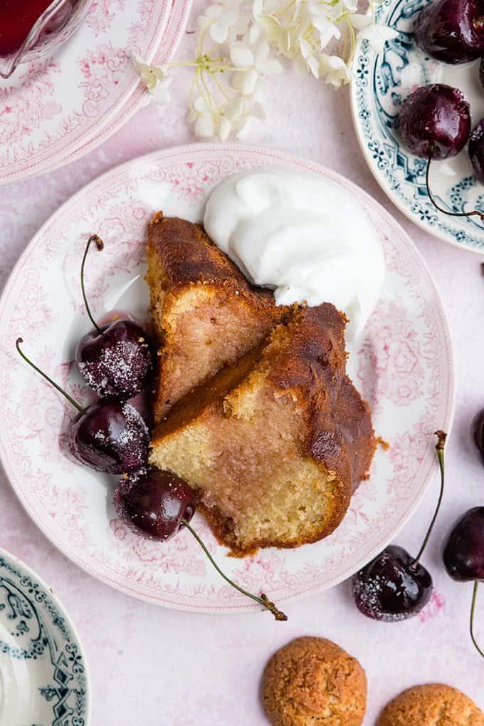 Amaretti ricotta semolina bundt cake with cherry compote – delicious served warm with a little crème fraîche on the side.