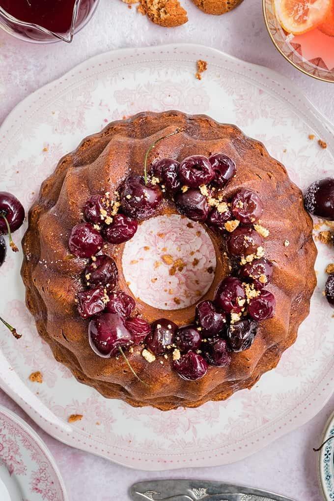 Amaretti ricotta semolina bundt cake with cherry compote – delicious served warm with a little crème fraîche on the side.