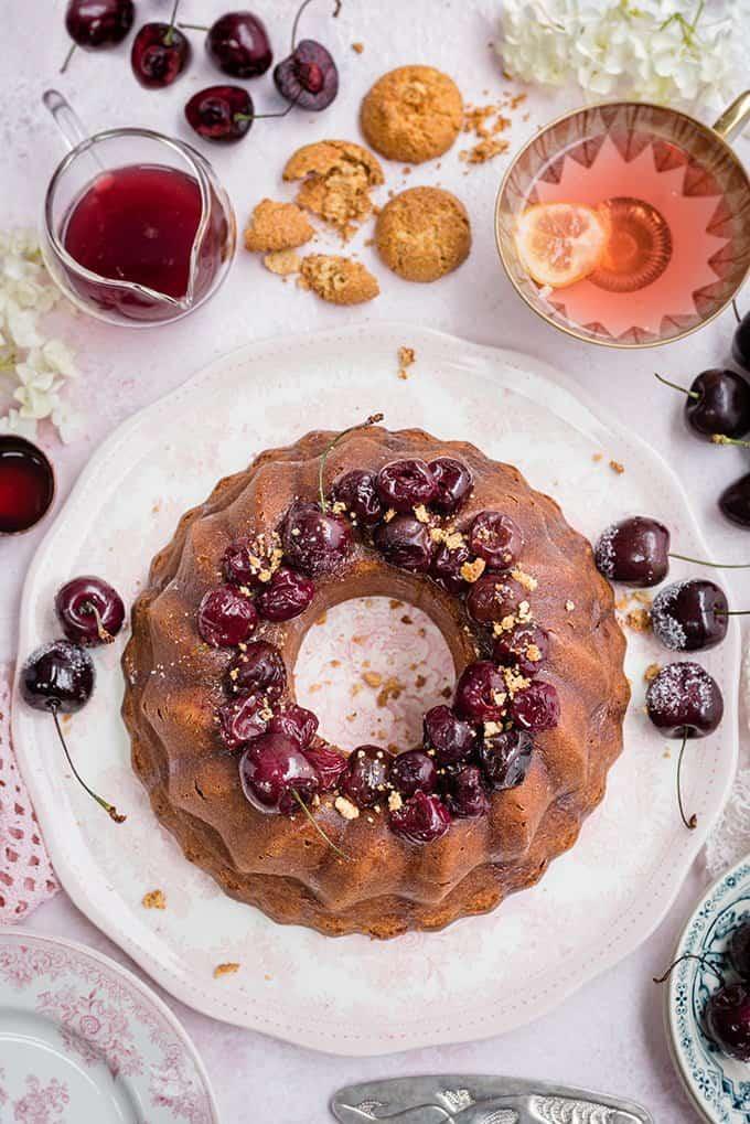 Amaretti ricotta semolina bundt cake with cherry compote – delicious served warm with a little crème fraîche on the side.