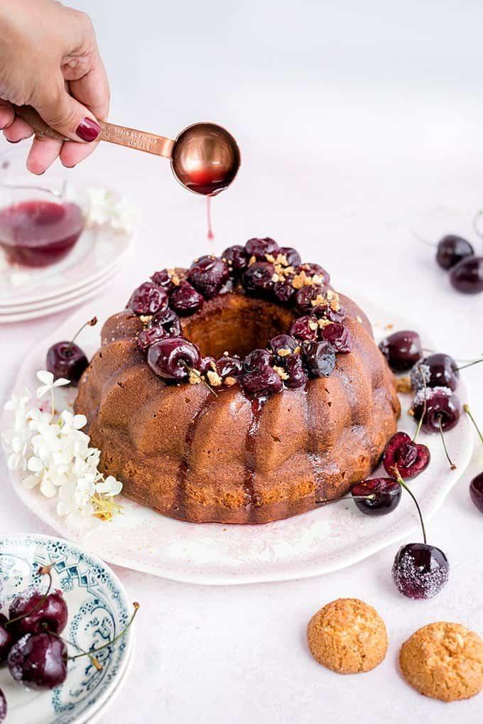 Amaretti ricotta semolina bundt cake with cherry compote