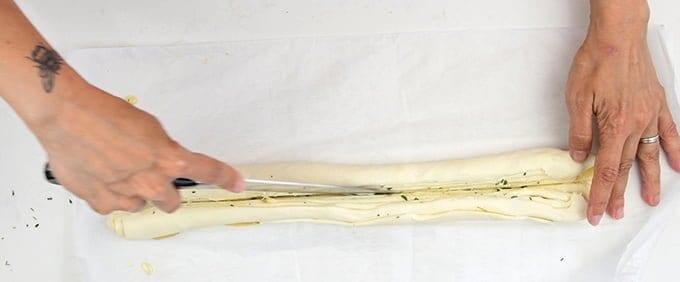 Cut puff pastry roll in half lengthwise