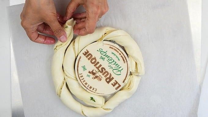Twist puff pastry pieces around box