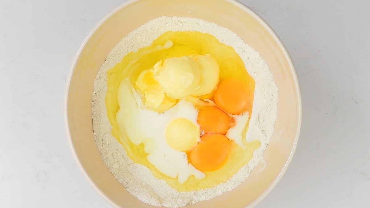 ingredients for banana cake in a mixing bowl