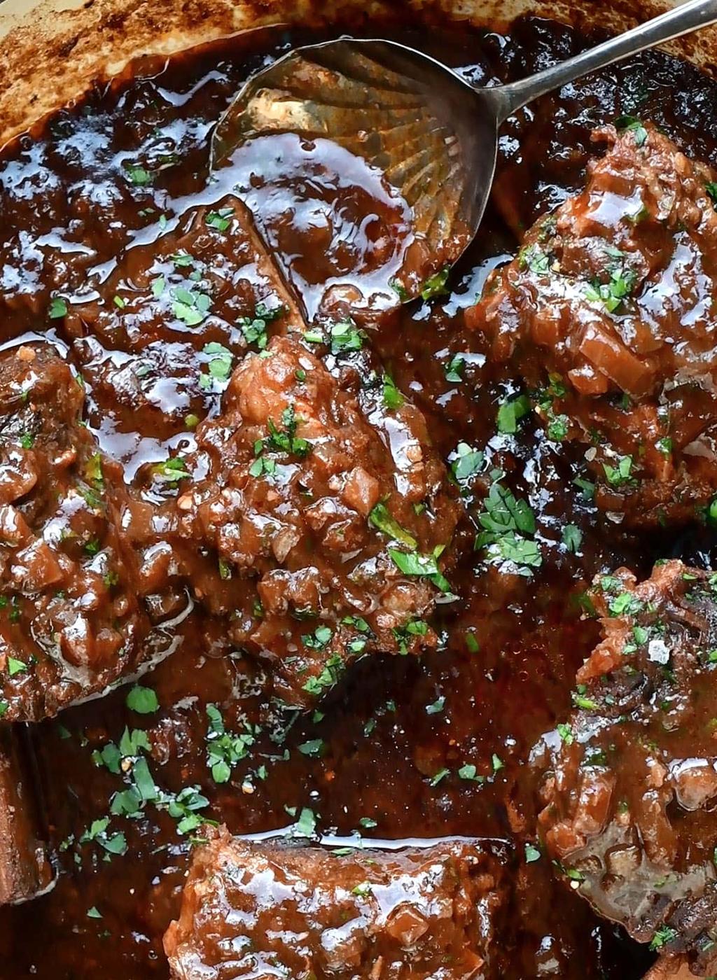 close up on beef short ribs braised in the oven