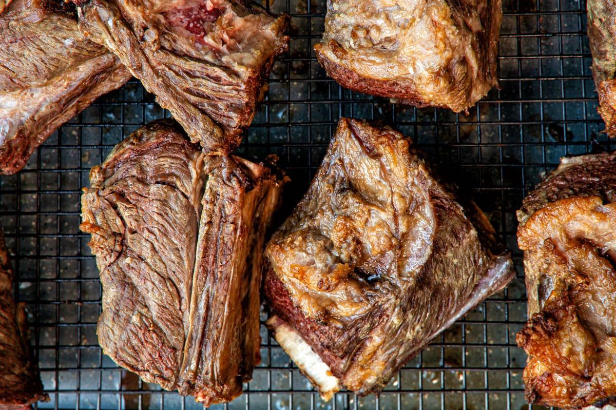 oven seared braised short ribs on a wire rack