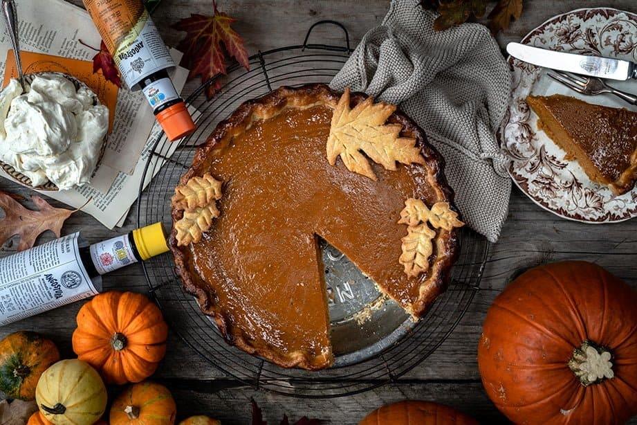 Pumpkin pie with slice taken out