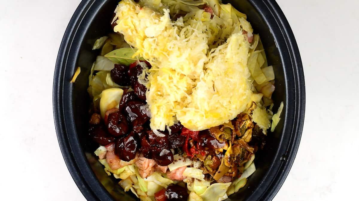 Ingredients for Bigos stew in a crockpot