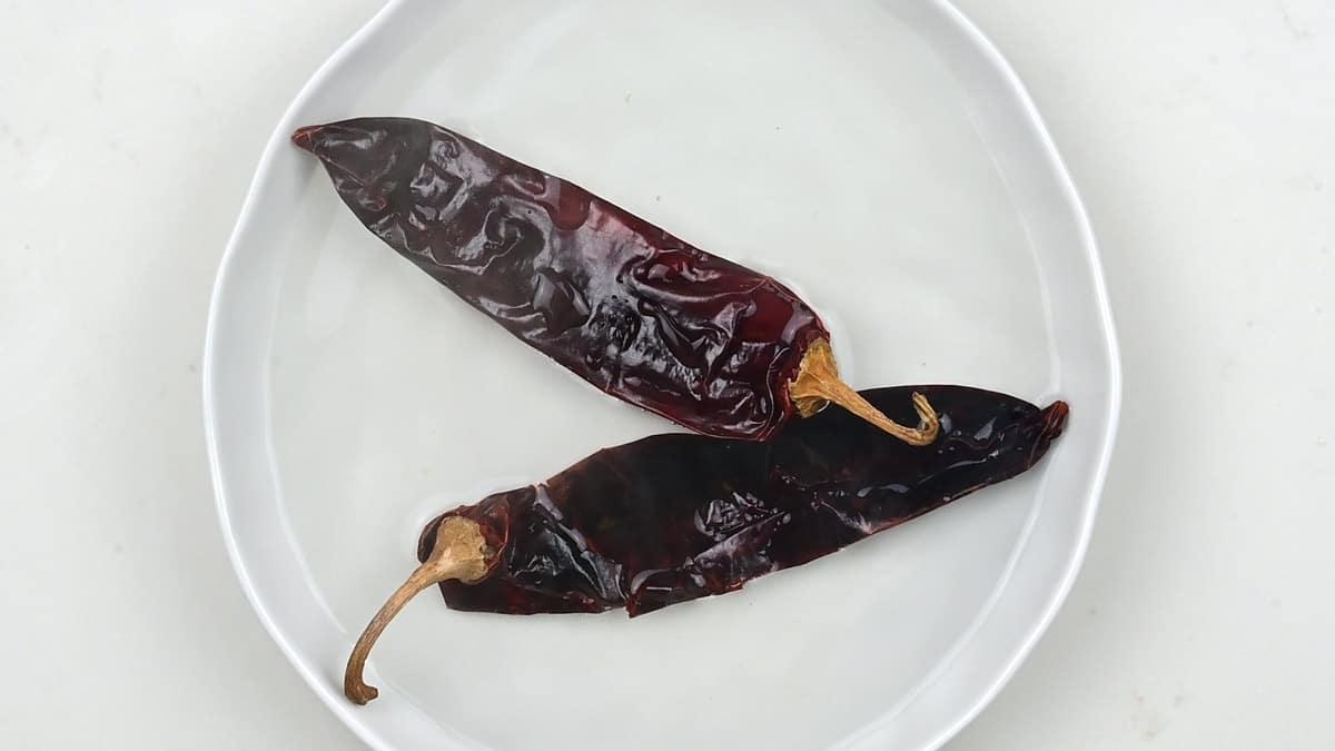 soaking dried guajillo peppers