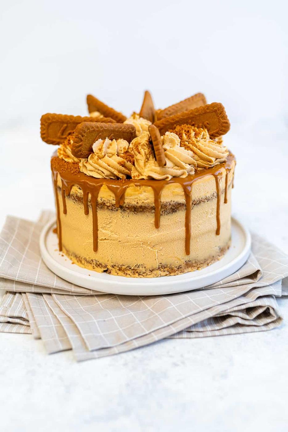 Biscoff layer cake on a round plate