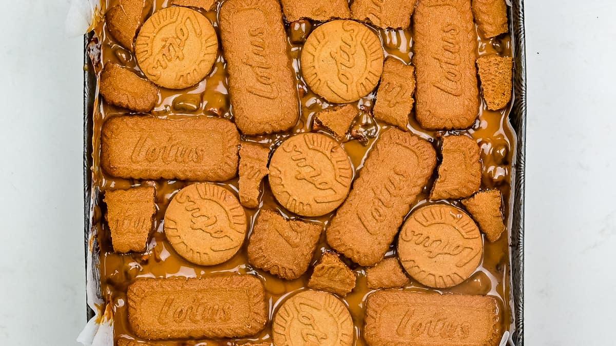 Rocky road topped with Biscoff spread and biscuits