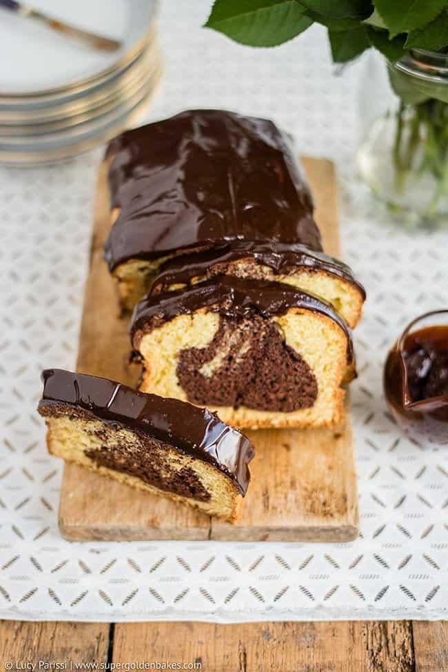sliced marble chocolate orange cake with chocolate icing