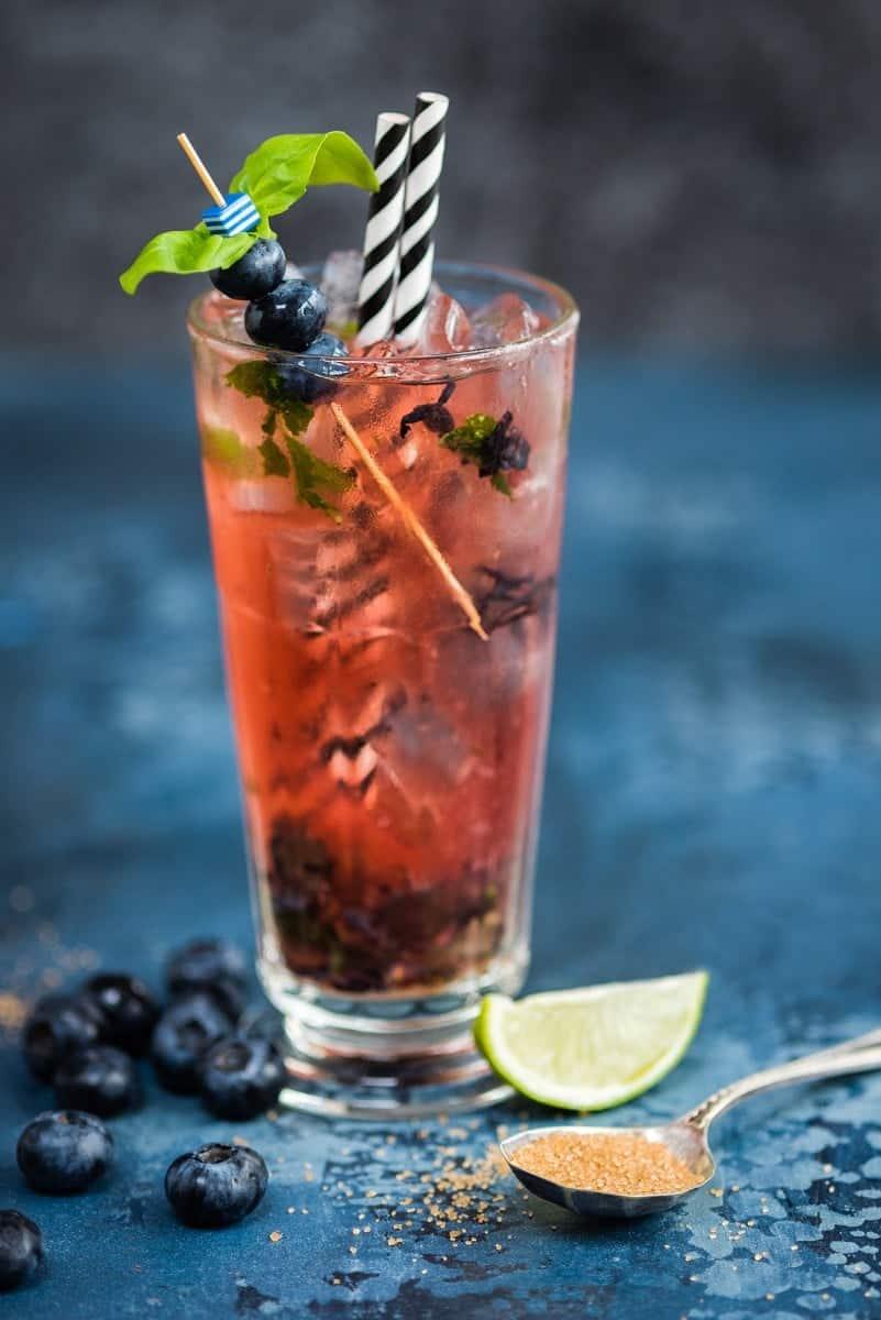 Give your Moscow Mule a spring update with muddled blueberries and basil – refreshing and delicious!