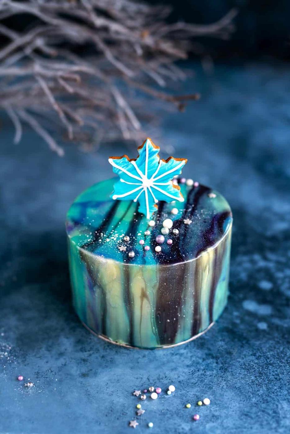 Mirror Glaze birthday cake decorated in a Frozen theme