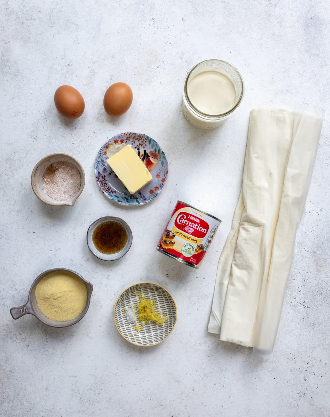 Ingredients for Bougatsa laid out on a white background