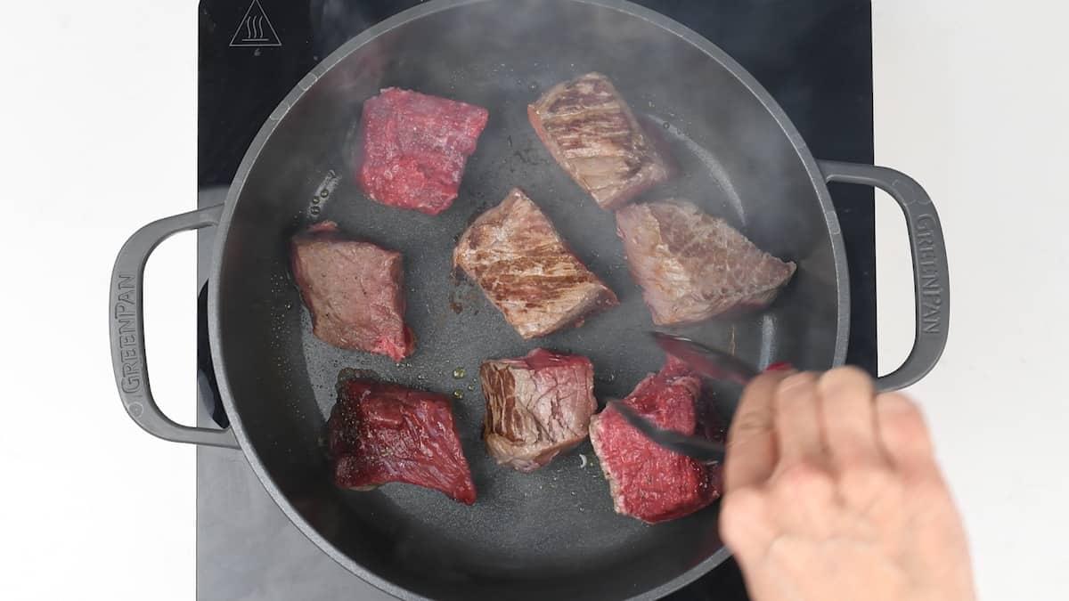 Searing beef cubes in a Dutch oven