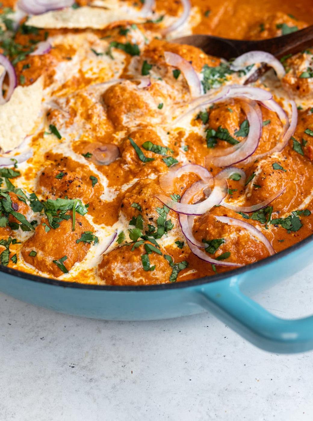 Pan of butter chicken meatballs