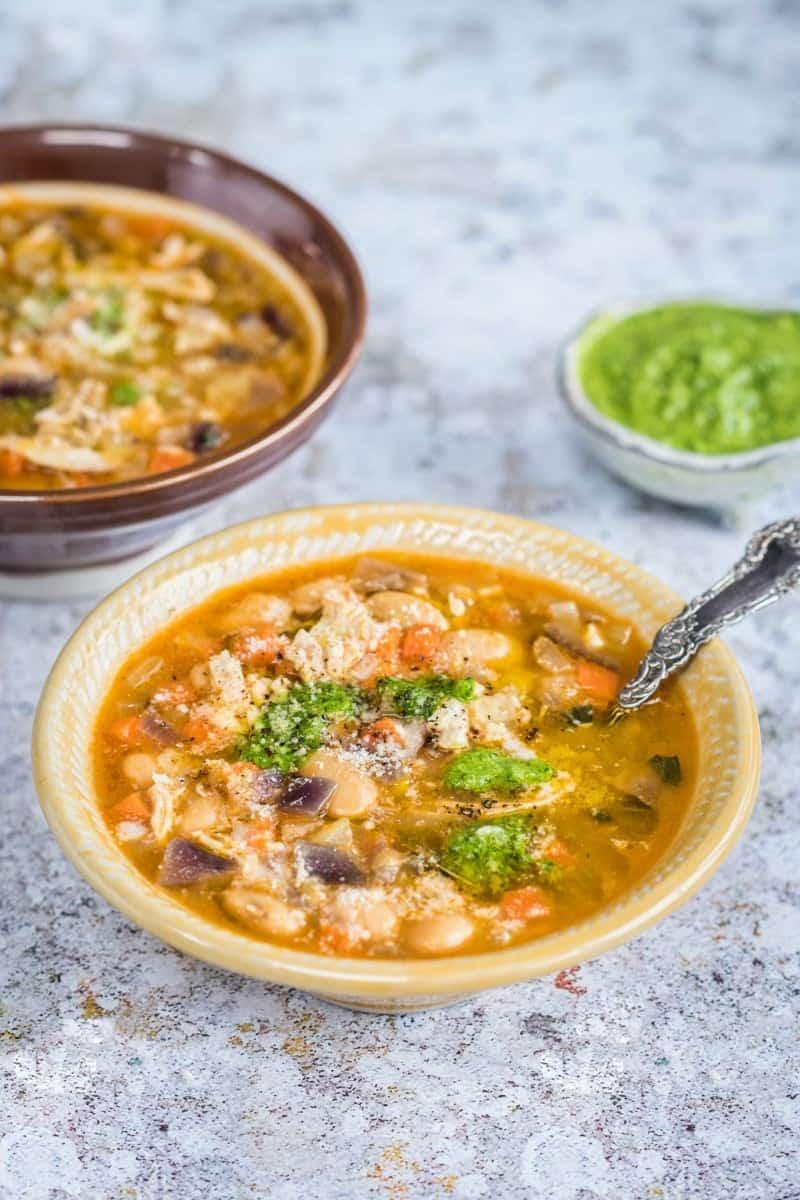Butterbean chicken soup with rocket pesto. Leave out the chicken for a vegetarian version.