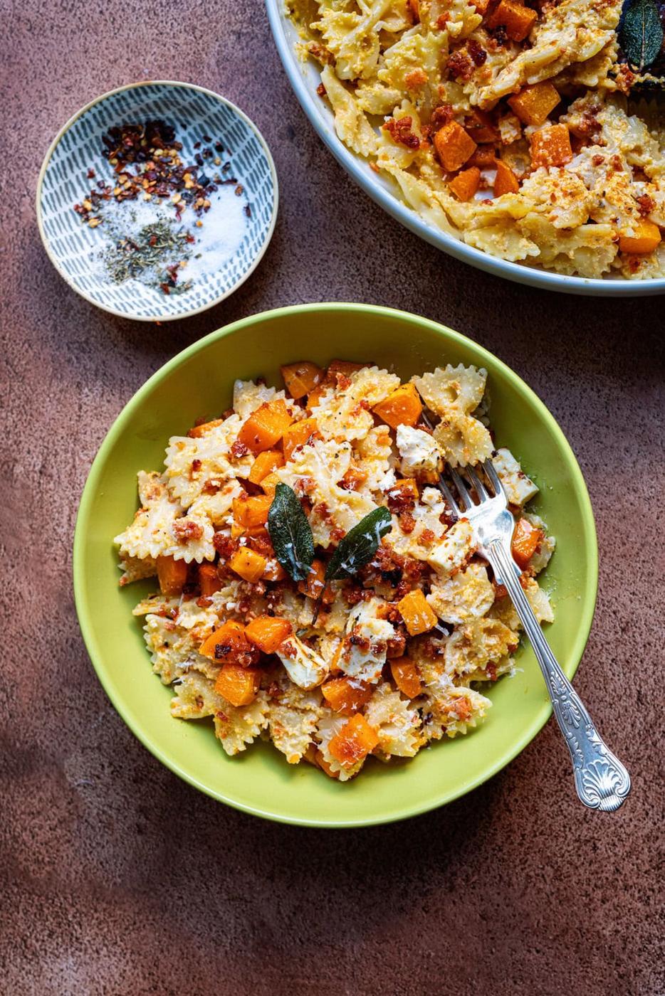 butternut squash and feta pasta in a bowl