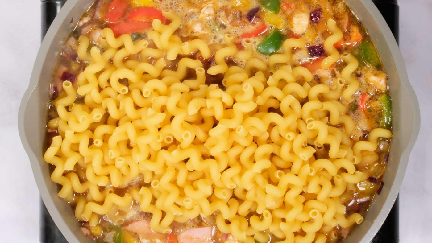 Adding pasta to pan