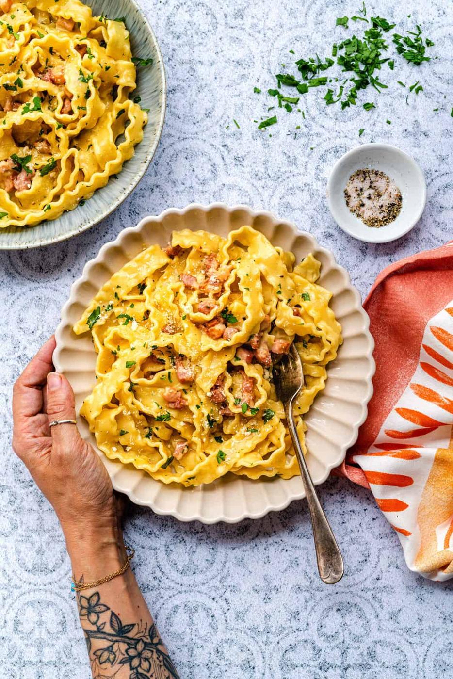 serving of pasta carbonara in bowls