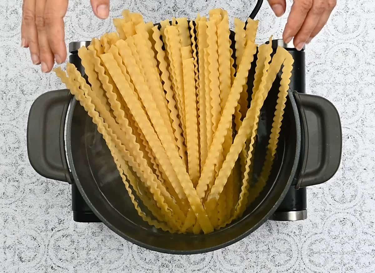 cooking pasta in a pot