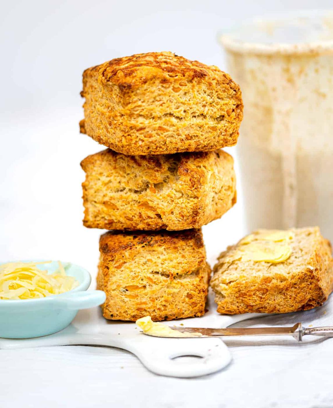 Sourdough Cheese scones stacked on a ceramic board