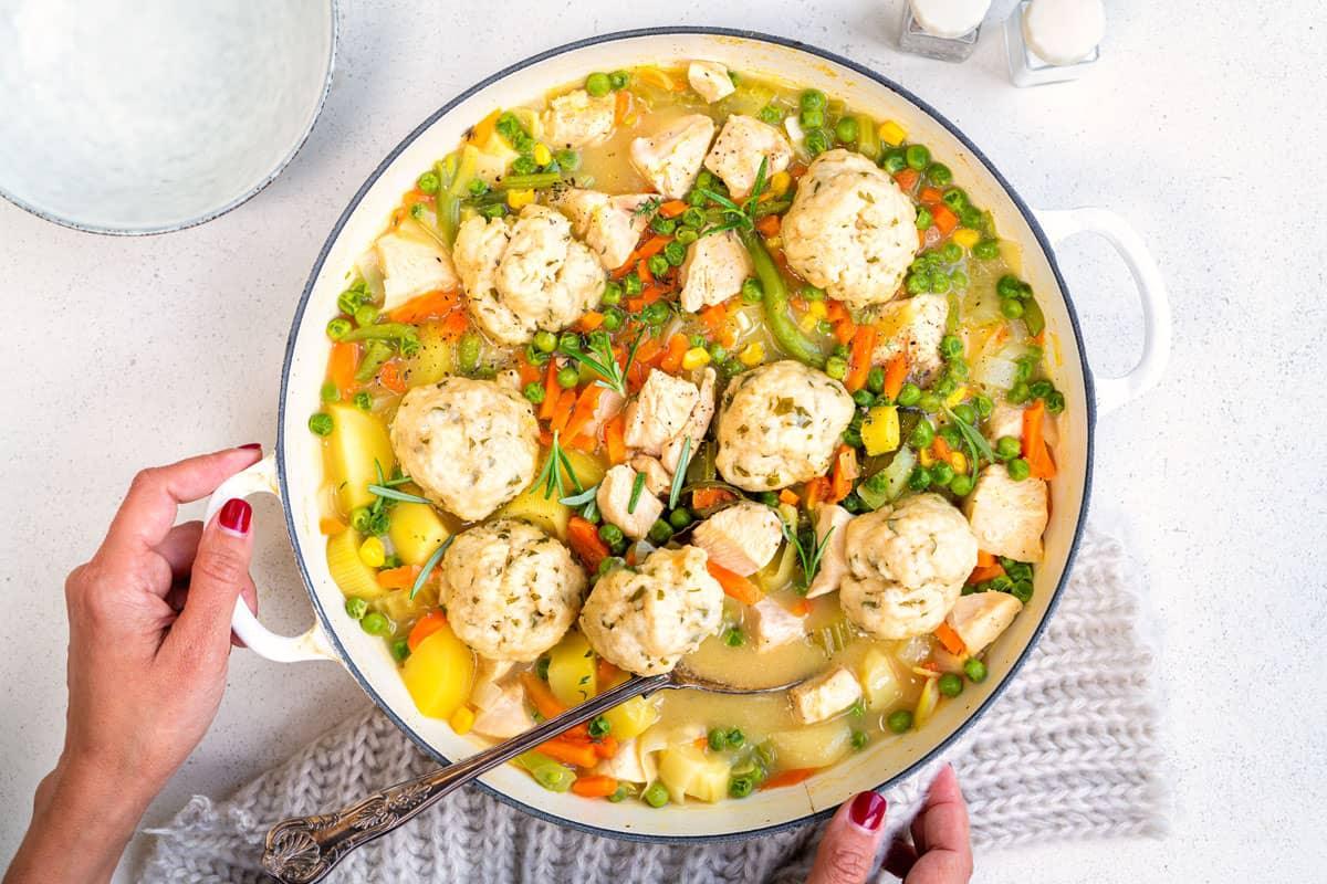 Slimming World Chicken Casserole with dumplings in a cast iron pot