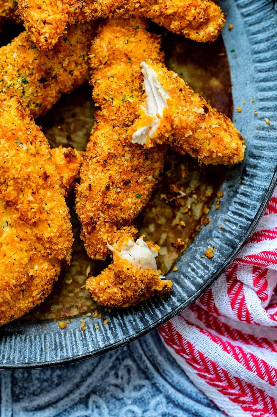 close up on a plate of crispy chicken goujons